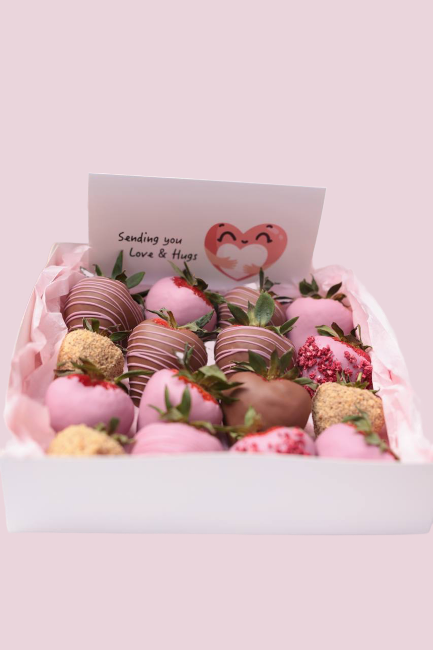 Experience the perfect blend of elegance and indulgence with our set featuring luscious chocolate-covered strawberries, fresh, fragrant roses, and a beautiful greeting card. Each strawberry is hand-dipped in rich chocolate, paired with vibrant roses to create a stunning and thoughtful gift. The set is artfully arranged and ready to convey your warmest wishes.