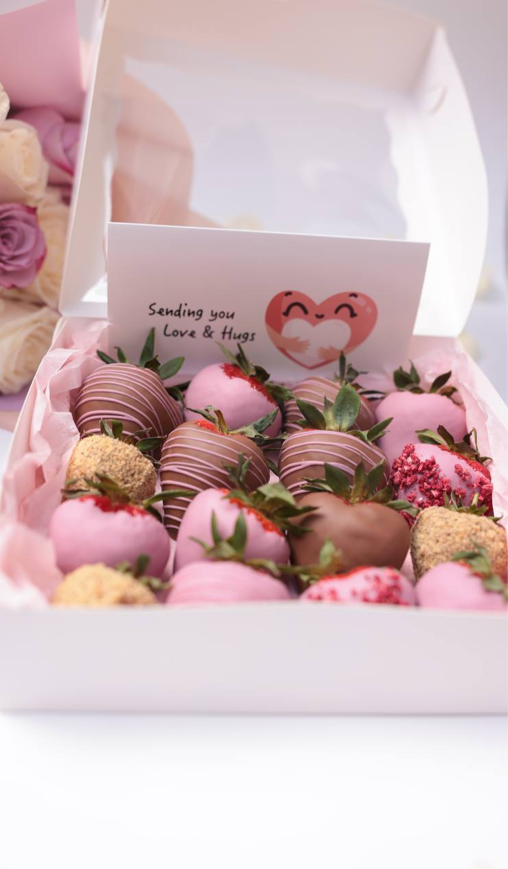 Experience the perfect blend of elegance and indulgence with our set featuring luscious chocolate-covered strawberries, fresh, fragrant roses, and a beautiful greeting card. Each strawberry is hand-dipped in rich chocolate, paired with vibrant roses to create a stunning and thoughtful gift. The set is artfully arranged and ready to convey your warmest wishes.