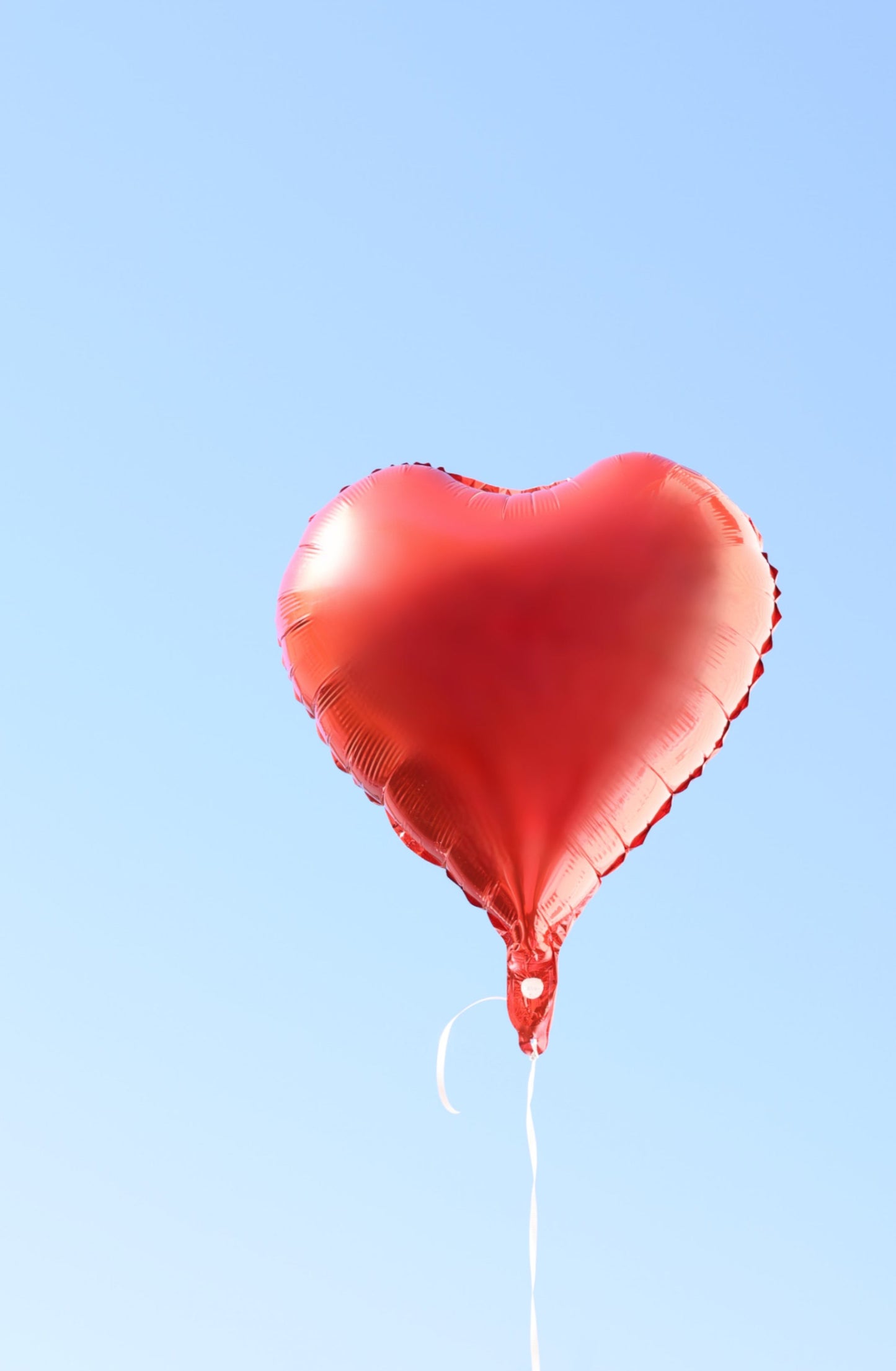 Bright and colorful helium balloon, perfect for celebrations and special occasions.