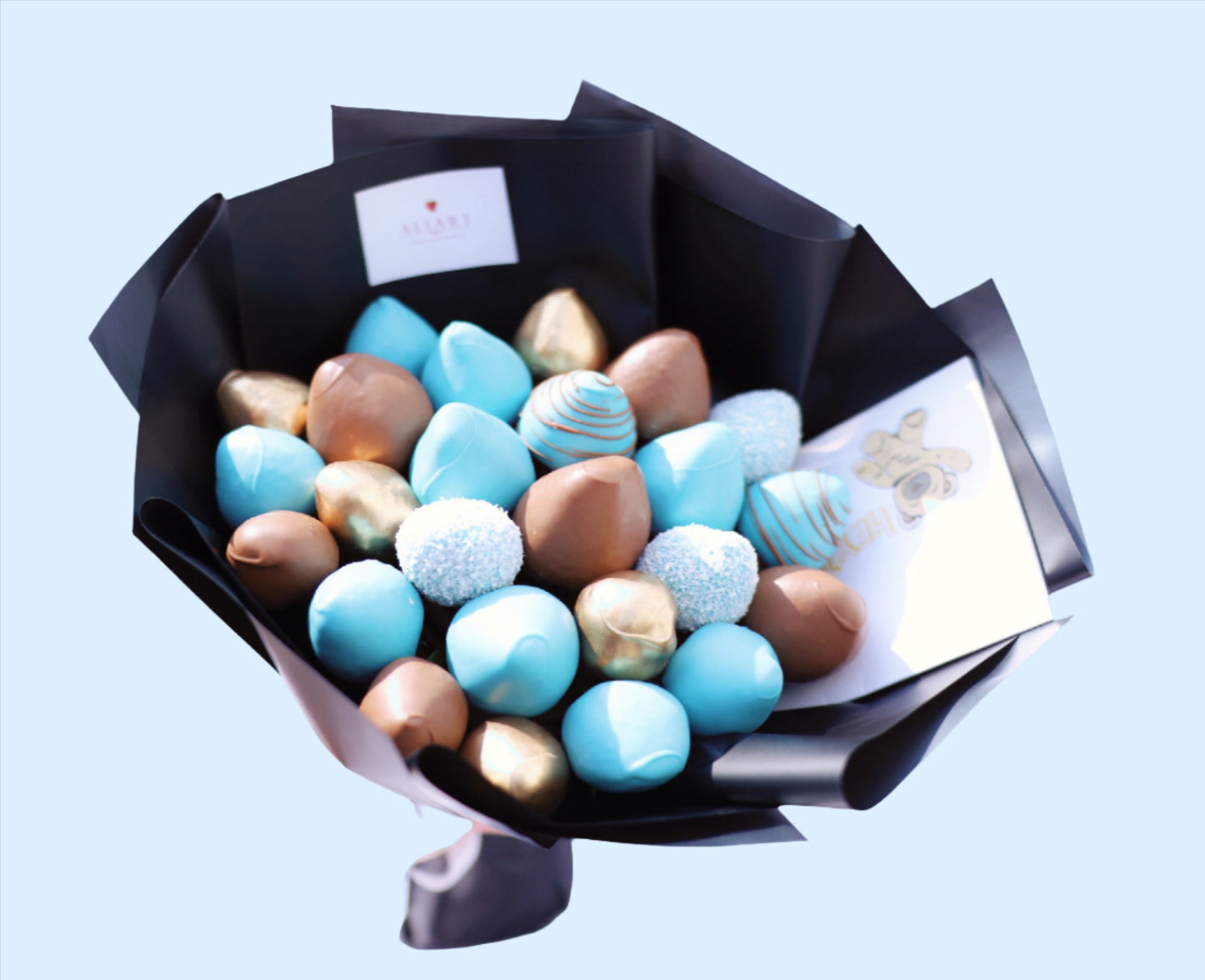 A stunning bouquet of luscious, fresh strawberries, artfully arranged and wrapped in elegant paper. Perfect for gifting or indulging yourself. Treat yourself or a loved one to this sweet and unique delight today!