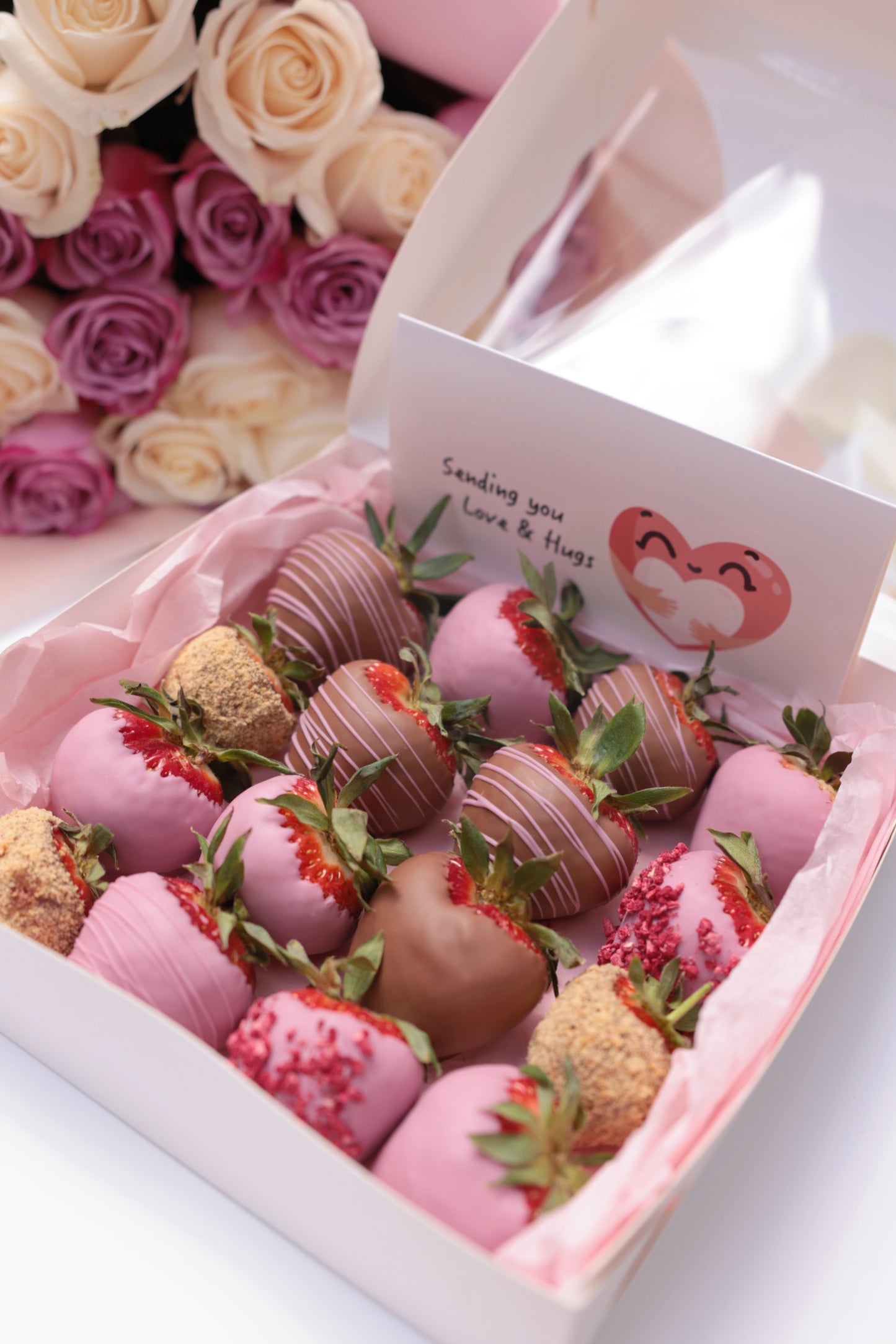 Experience the perfect blend of elegance and indulgence with our set featuring luscious chocolate-covered strawberries, fresh, fragrant roses, and a beautiful greeting card. Each strawberry is hand-dipped in rich chocolate, paired with vibrant roses to create a stunning and thoughtful gift. The set is artfully arranged and ready to convey your warmest wishes.