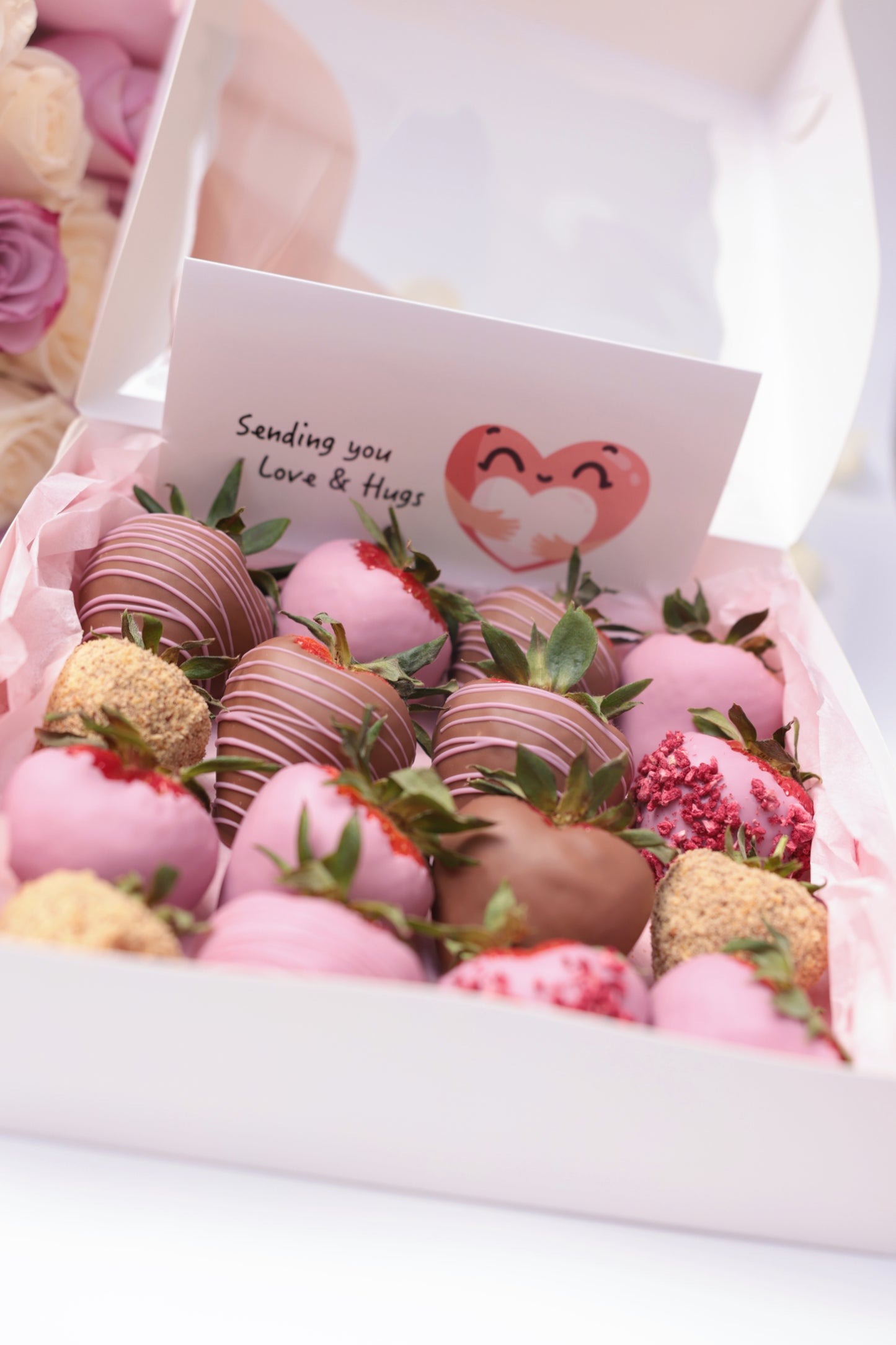 Experience the perfect blend of elegance and indulgence with our set featuring luscious chocolate-covered strawberries, fresh, fragrant roses, and a beautiful greeting card. Each strawberry is hand-dipped in rich chocolate, paired with vibrant roses to create a stunning and thoughtful gift. The set is artfully arranged and ready to convey your warmest wishes.