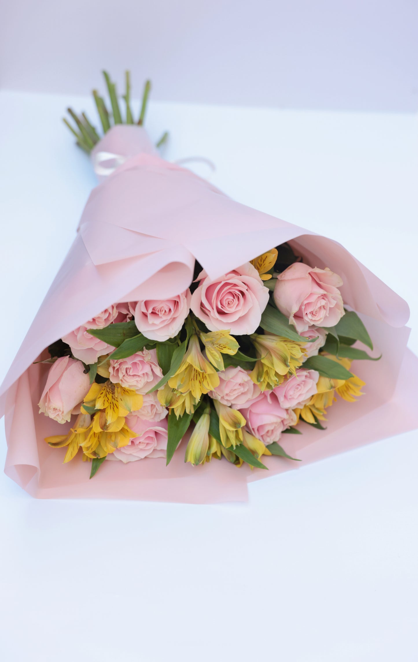 Brighten someone's day with our beautiful bouquet of roses and seasonal flowers, accompanied by a personalized greeting card. This stunning arrangement features fresh, vibrant roses mixed with an assortment of seasonal blooms, creating a perfect blend of colors and fragrances. The bouquet, paired with a heartfelt greeting card, makes for an exquisite gift suitable for any special occasion.