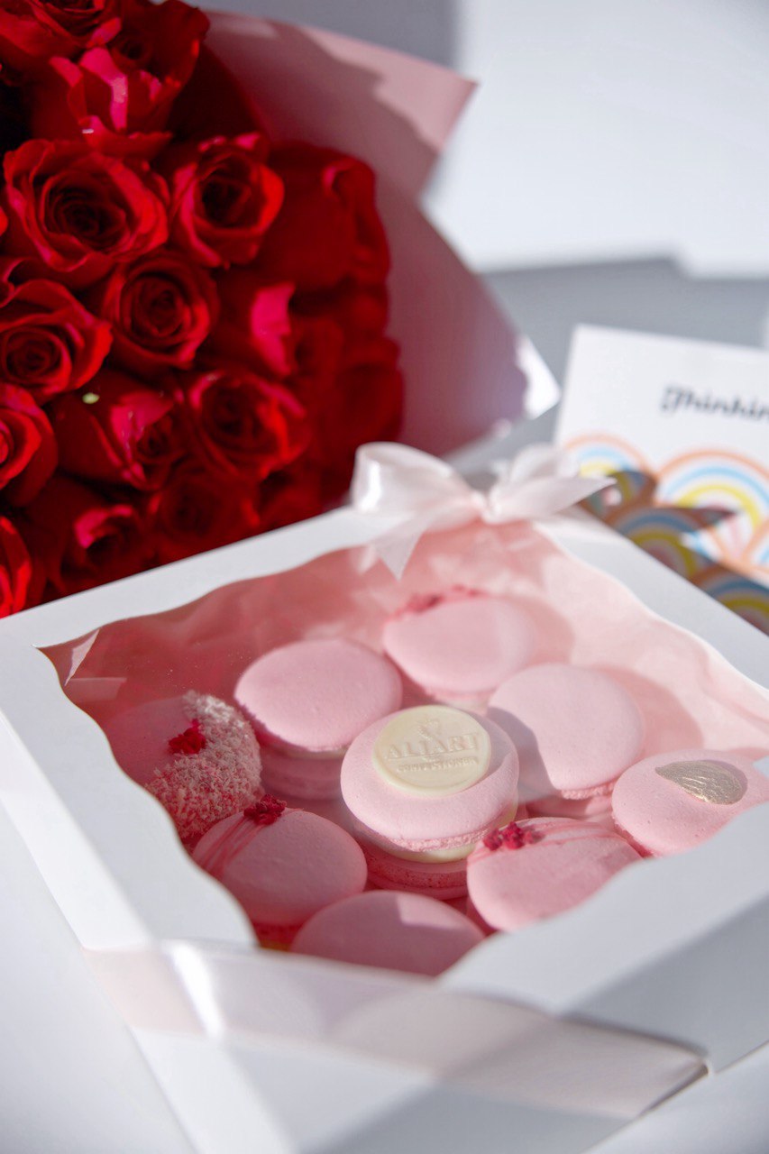 Surprise someone special with our elegant set featuring a bouquet of fresh roses, a selection of delicate macarons, and a personalized greeting card. The vibrant roses add a touch of natural beauty and fragrance, while the assorted macarons offer a delightful array of flavors and colors. This thoughtfully arranged set, complete with a heartfelt greeting card, is perfect for any occasion, expressing your sentiments with style and sweetness.