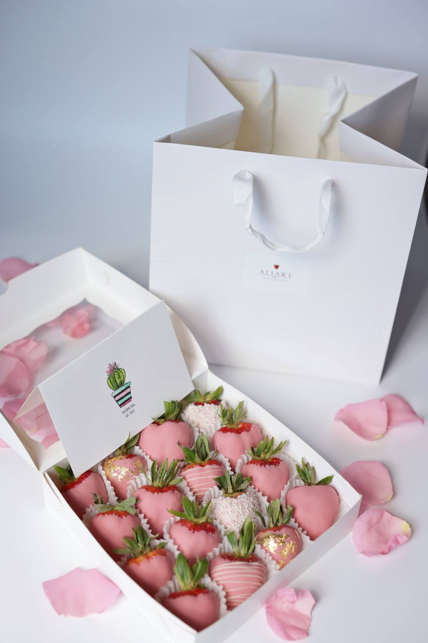 Indulge in a luxurious treat with our box of fresh, juicy strawberries, each carefully hand-dipped in rich, velvety Belgian chocolate. This delightful assortment is perfect for special occasions or as a decadent gift for someone you love. The strawberries are beautifully arranged in an elegant box, ready to impress with their glossy, chocolatey sheen and mouthwatering aroma.