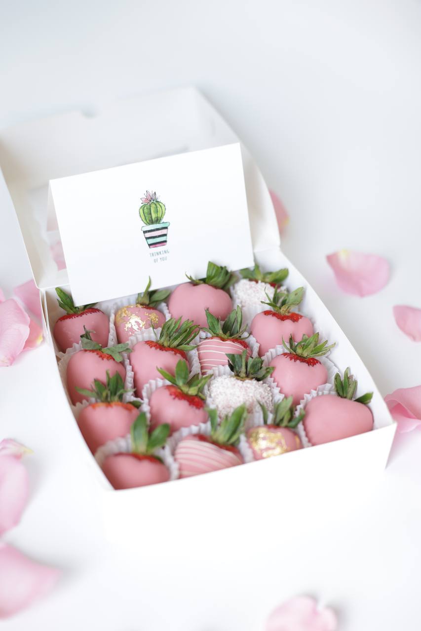 Indulge in a luxurious treat with our box of fresh, juicy strawberries, each carefully hand-dipped in rich, velvety Belgian chocolate. This delightful assortment is perfect for special occasions or as a decadent gift for someone you love. The strawberries are beautifully arranged in an elegant box, ready to impress with their glossy, chocolatey sheen and mouthwatering aroma.