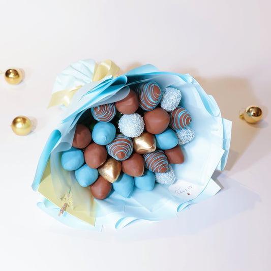 Chocolate-covered strawberry bouquet in milk and blue chocolate with gold accents, gift-wrapped, New York dessert delivery