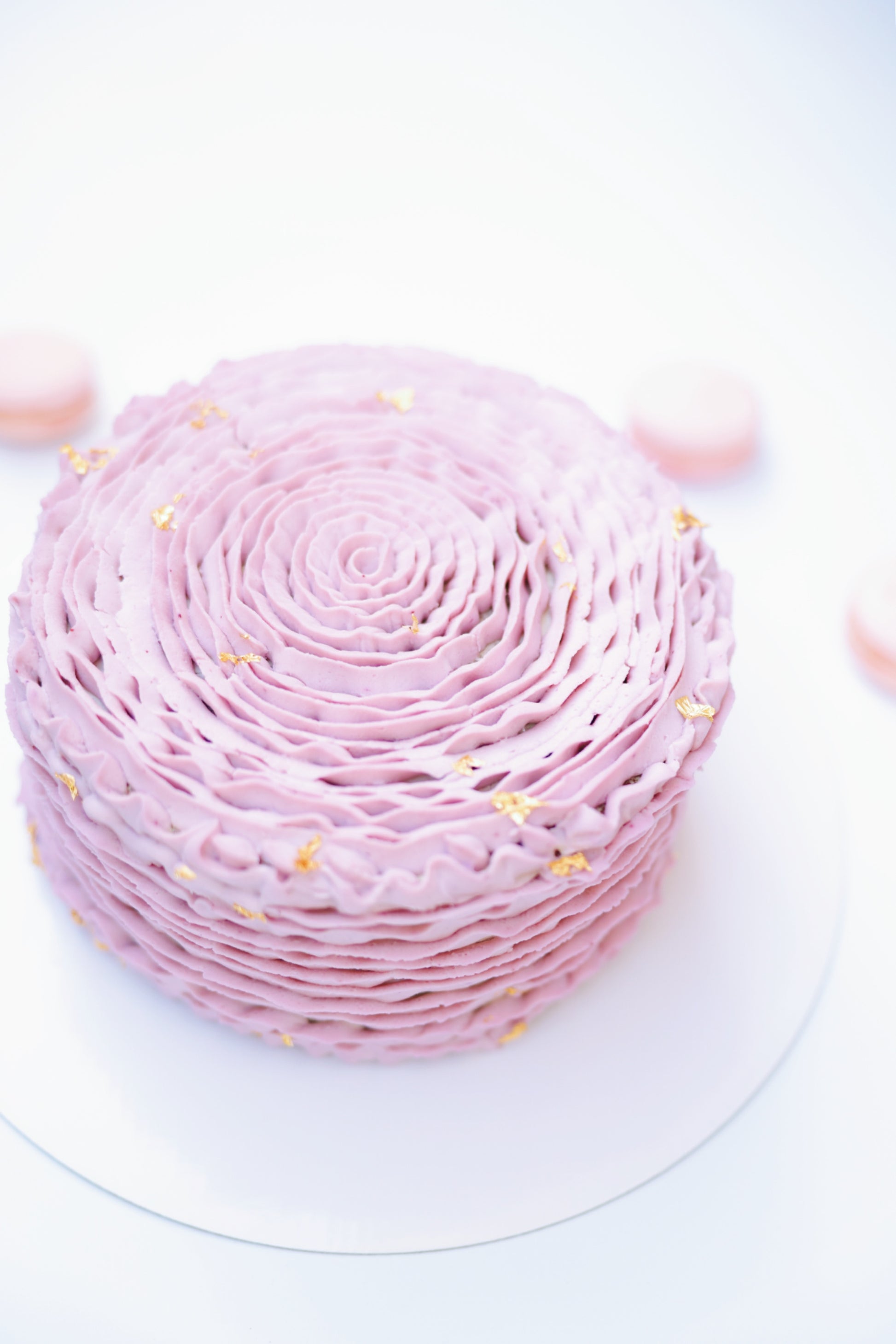 Indulge in elegance with our Soft-Pink Rose Honey Cake. Featuring layers of delicate honey-infused sponge and creamy frosting, all adorned with beautiful soft-pink rose decorations. Perfect for any special occasion. Order now to delight your senses and impress your guests!