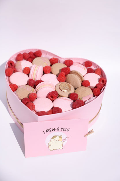 passion fruit chocolate macarons in heart box NYC
