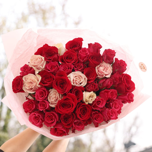 Elegant bouquet of 45 fresh roses in vibrant shades, perfect for any special occasion