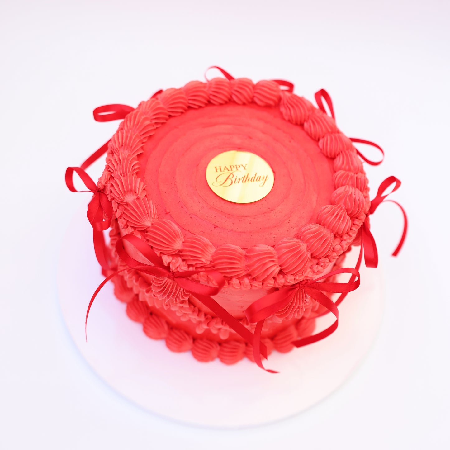 Close-up of strawberry filling and soft honey cake layers