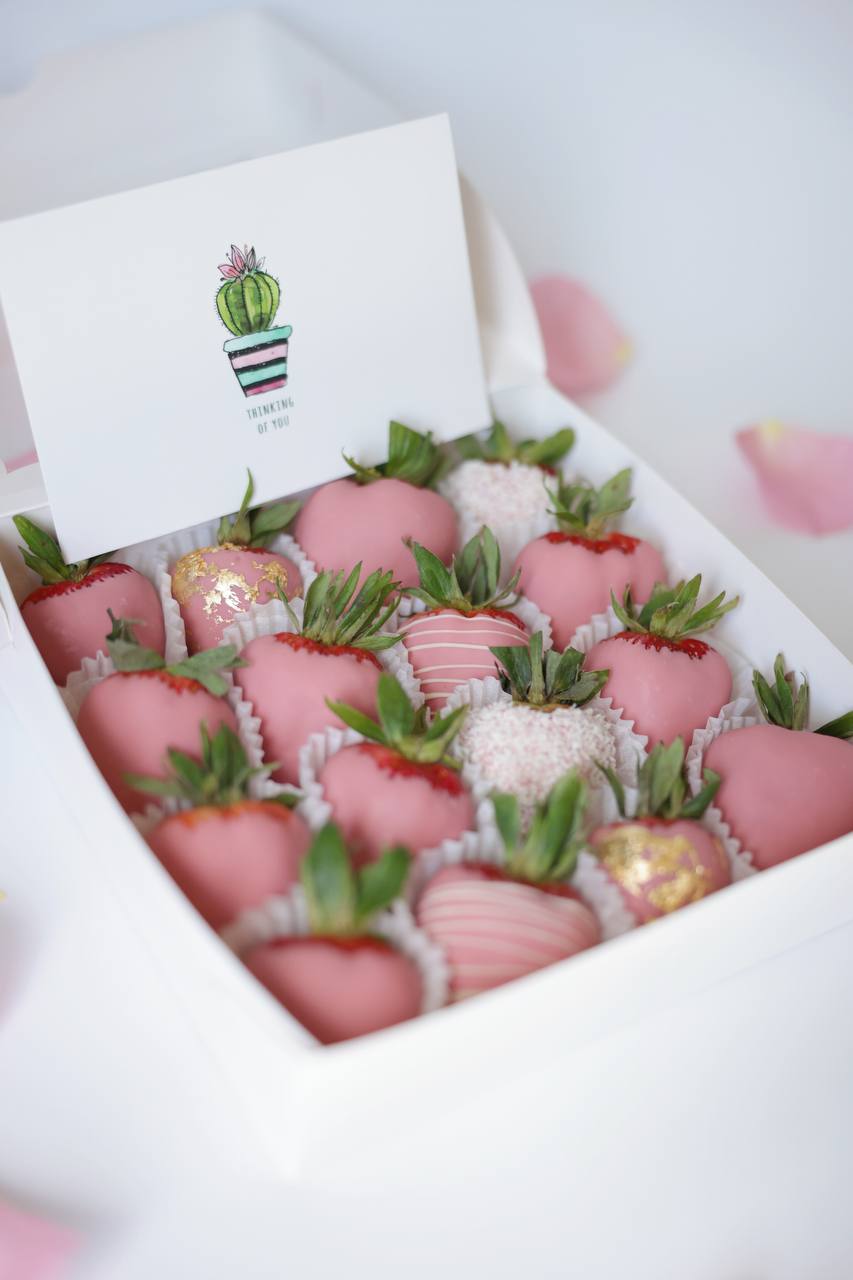Indulge in a luxurious treat with our box of fresh, juicy strawberries, each carefully hand-dipped in rich, velvety Belgian chocolate. This delightful assortment is perfect for special occasions or as a decadent gift for someone you love. The strawberries are beautifully arranged in an elegant box, ready to impress with their glossy, chocolatey sheen and mouthwatering aroma.