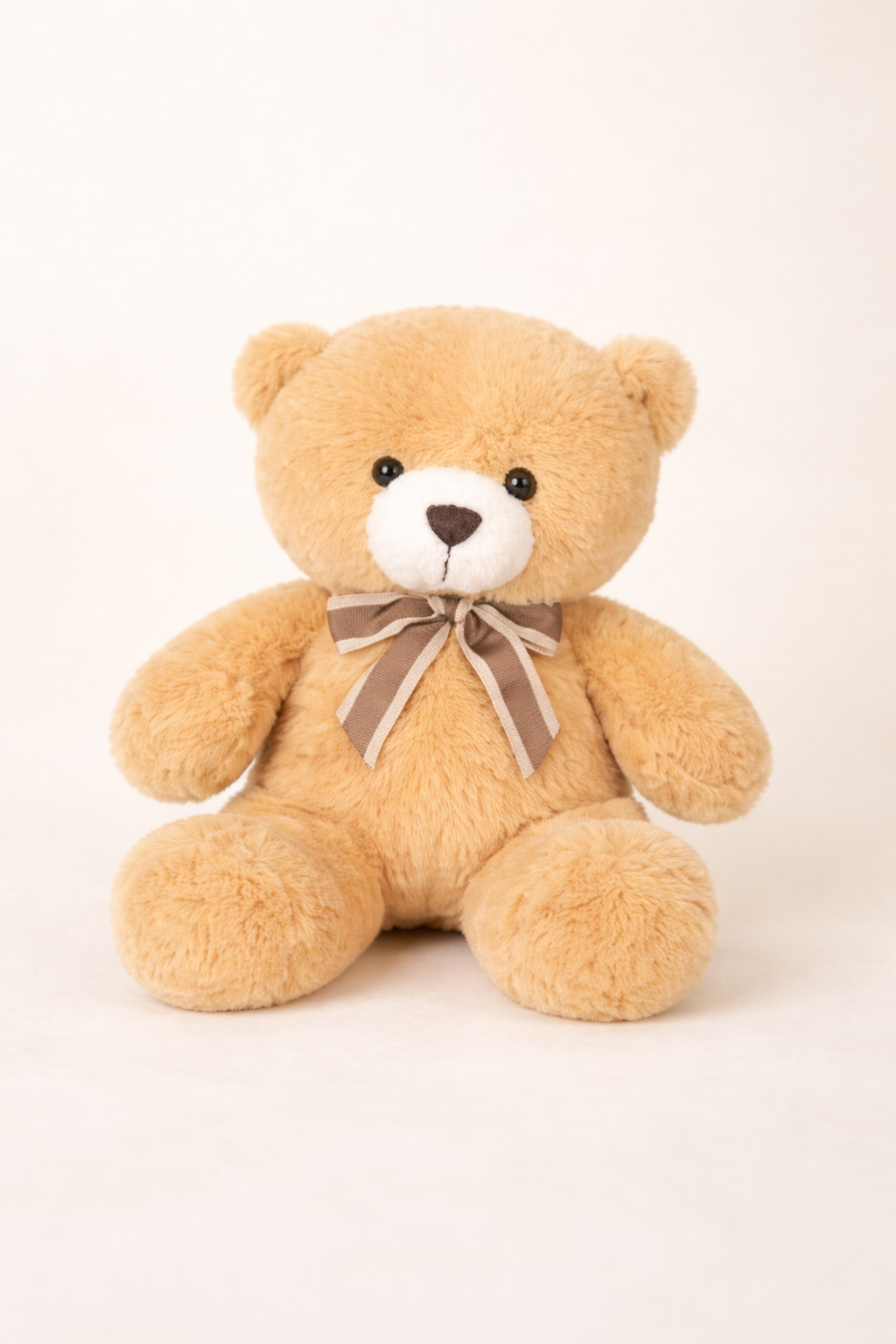 Cute plush teddy bear perfect for gift boxes and bouquets
